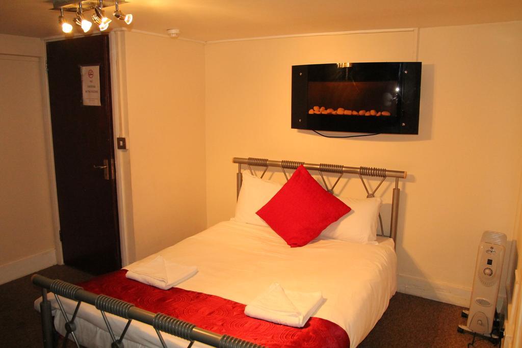 London Olympus Hotel Nirvana Londres Quarto foto