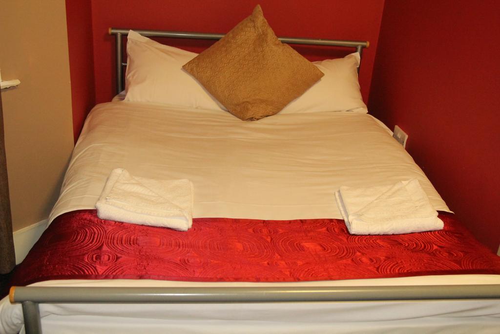 London Olympus Hotel Nirvana Londres Quarto foto