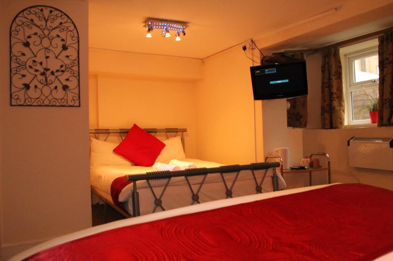 London Olympus Hotel Nirvana Londres Quarto foto